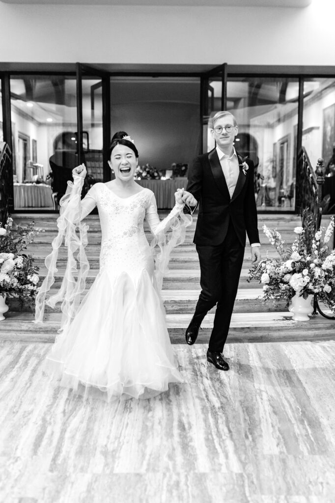 bride & groom entering their Jasna Polana wedding reception