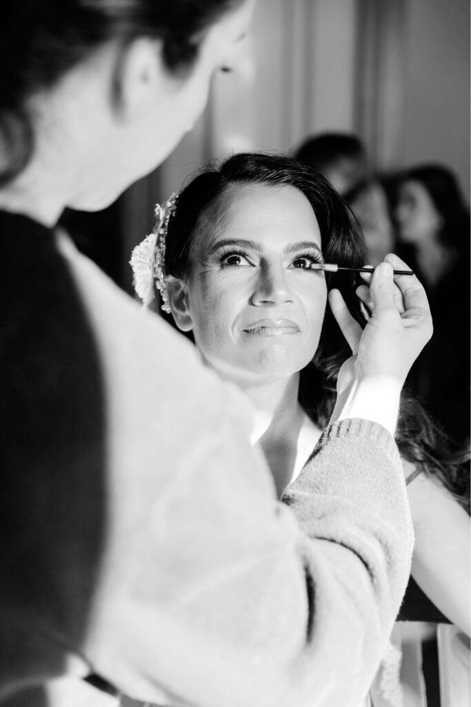 Philadelphia bride getting her wedding day makeup done by Emily Wren Photography