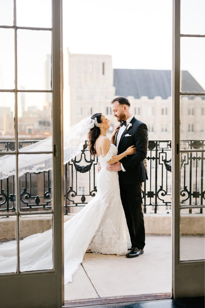 bride & groom wedding portrait on rooftop balcony in Philadelphia