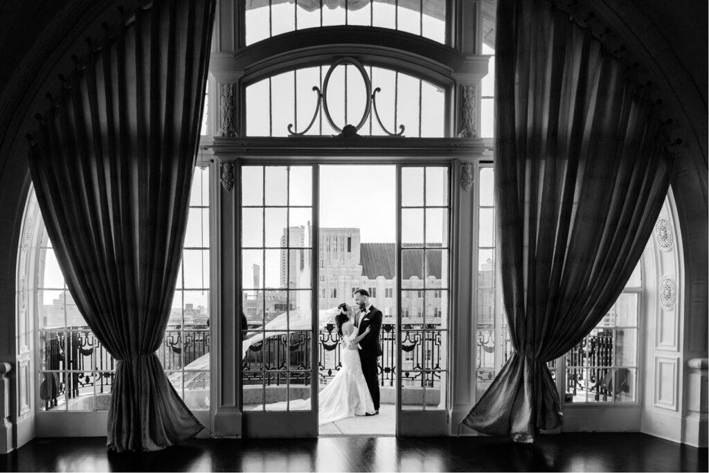 wedding portraits on Bellevue Hotel balcony by Emily Wren Photography