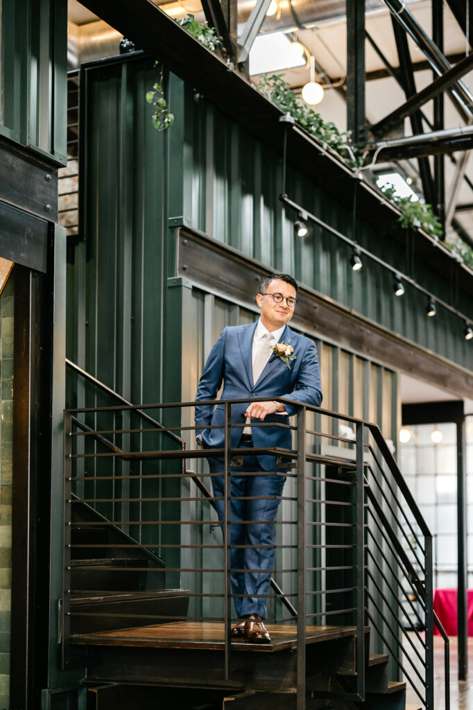 Philadelphia groom at his modern-industrial wedding venue by Emily Wren Photography