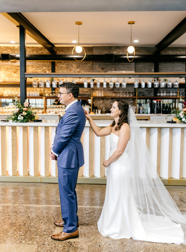 bride and groom's first look at Lilah in Fishtown in Philadelphia