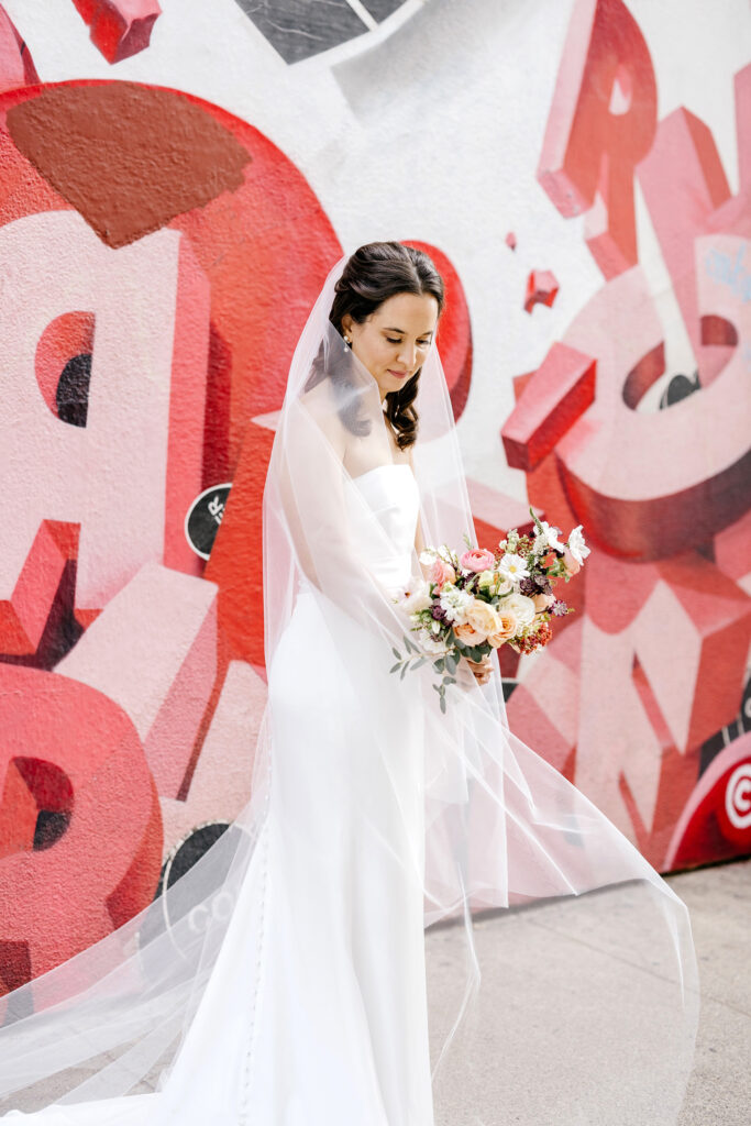 bridal portrait in Philadelphia with veil blowing in the wind by Emily Wren Photography