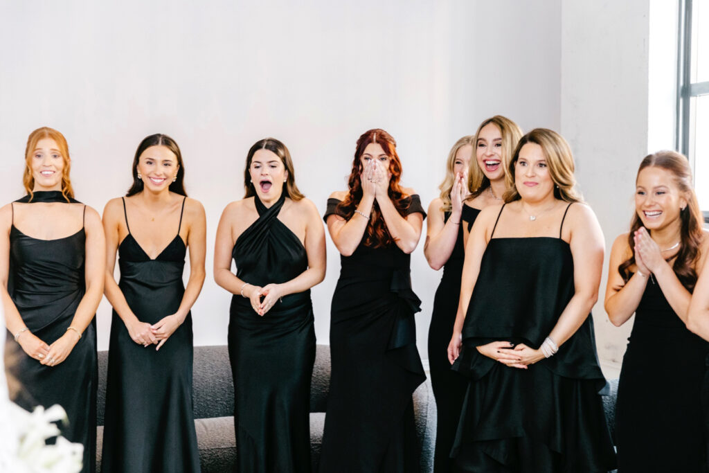 brides first look with her bridesmaids by Philadelphia wedding photographer Emily Wren Photography