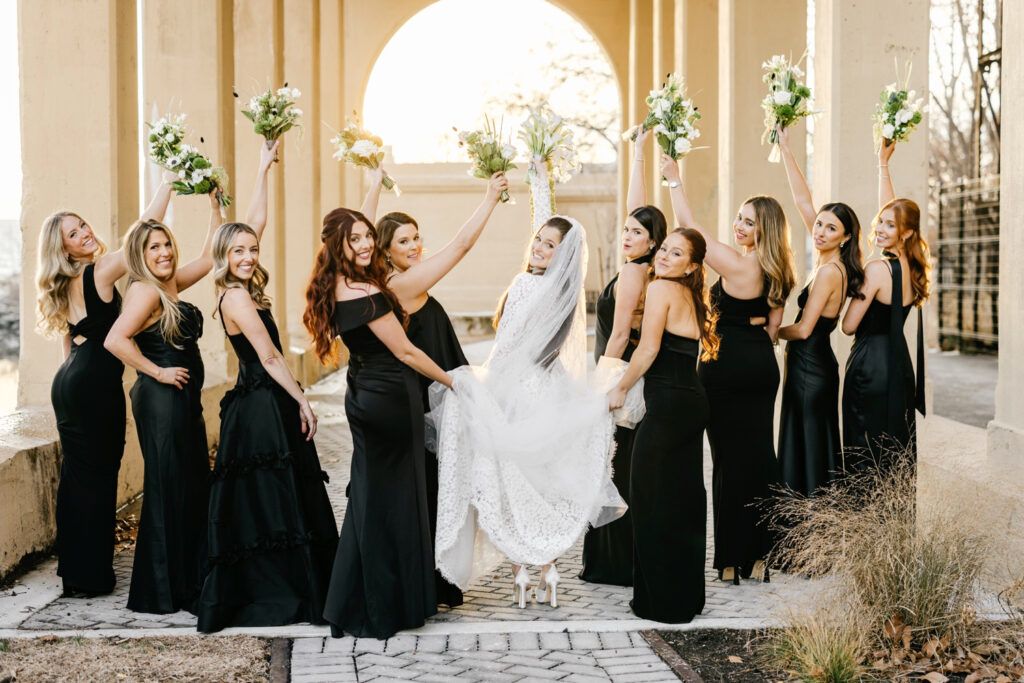 Philadelphia bride with her bridesmaids in black bridesmaid dresses