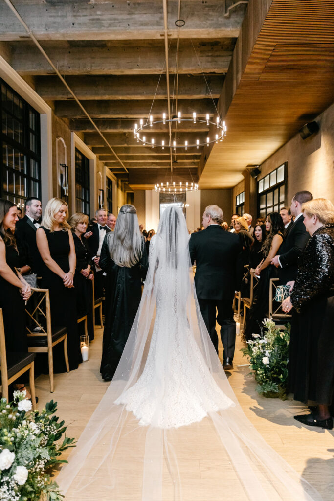 bride walking down the aisle at The Switch House at Cescaphe by Emily Wren Photography