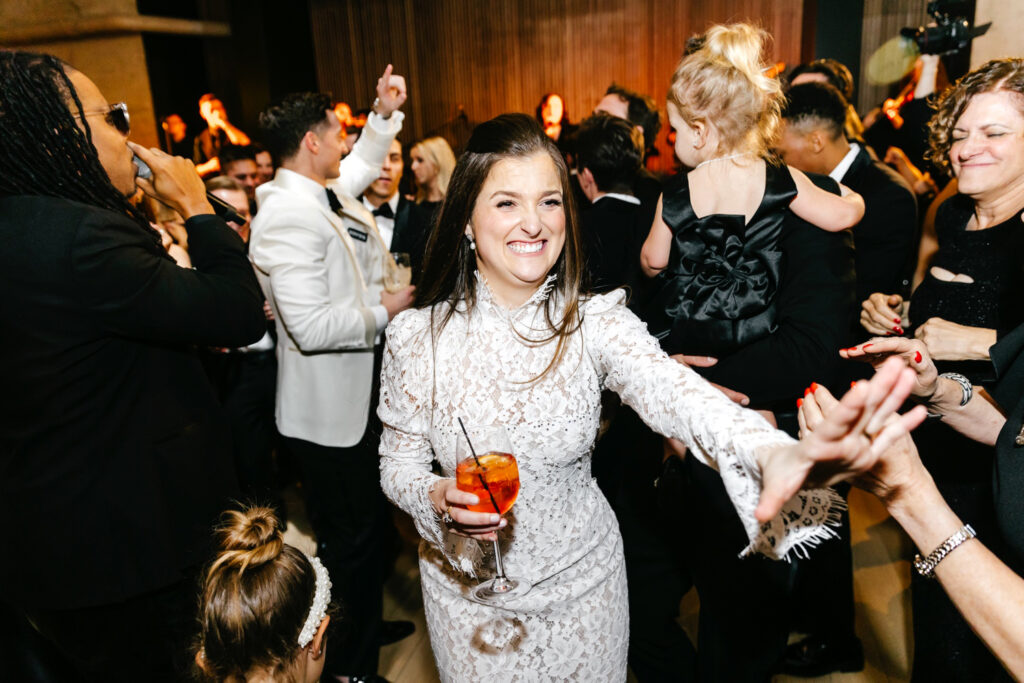 Philadelphia bride having fun at her winter wedding reception