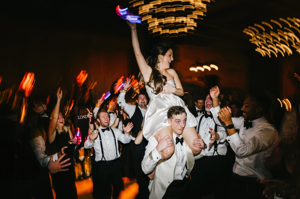 bride and groom having fun at their Cescaphe wedding reception