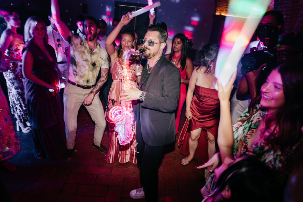 guests having fun and dancing at Italian wedding reception