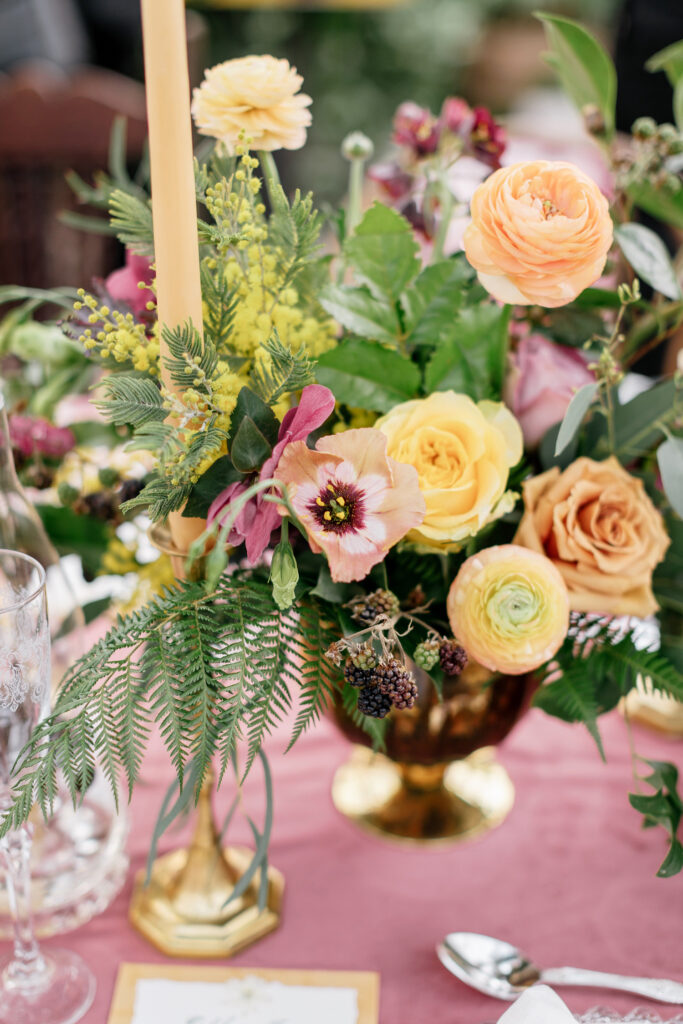 vibrant spring wedding reception table florals