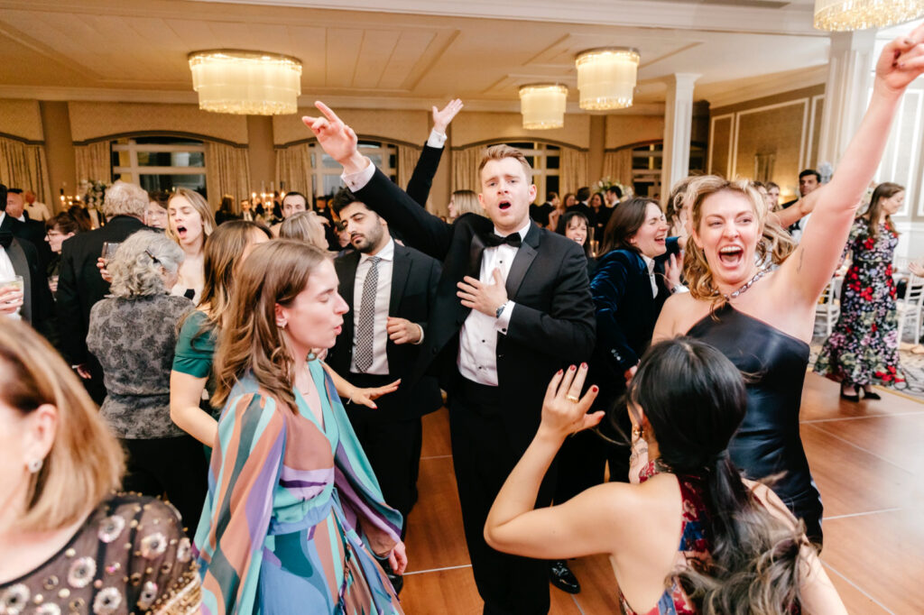 Philadelphia wedding guests dancing ad having fun at wedding reception by Emily Wren Photography