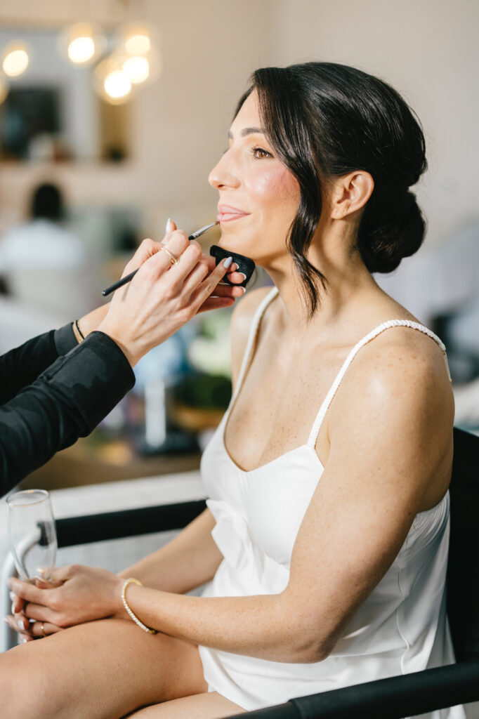 Philadelphia bride getting her spring wedding day makeup done
