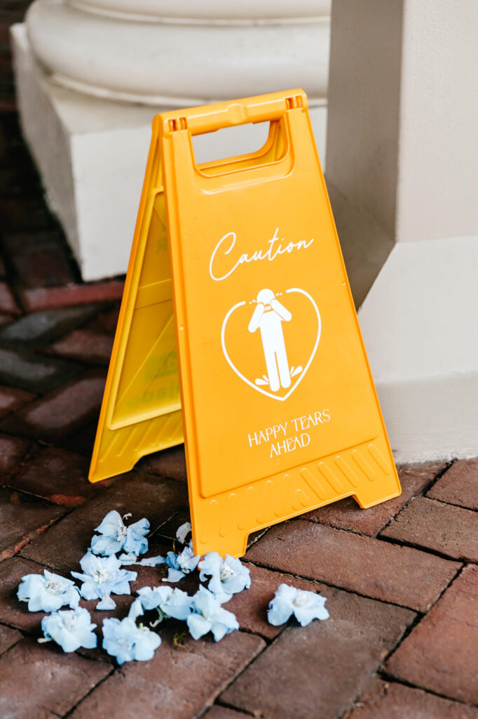 wedding ceremony caution "happy tears ahead" sign