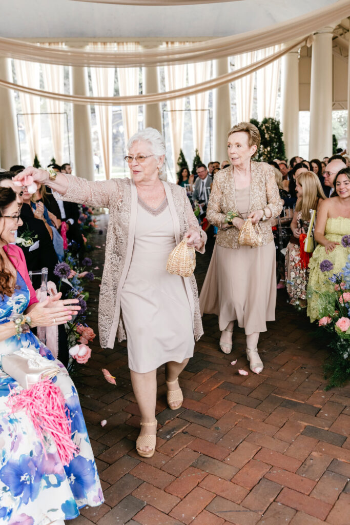 grandma flowergirls walking down the aisle of a Philadelphia wedding ceremony by Emily Wren Photography