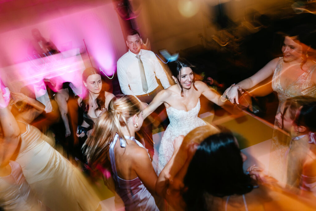 bride dancing & having fun with her friends at her luxurious Philadelphia wedding reception