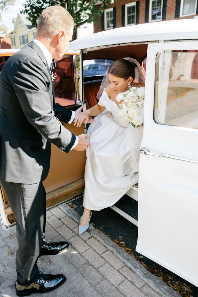 New Jersey bride arriving to her Fall wedding ceremony by Emily Wren Photography