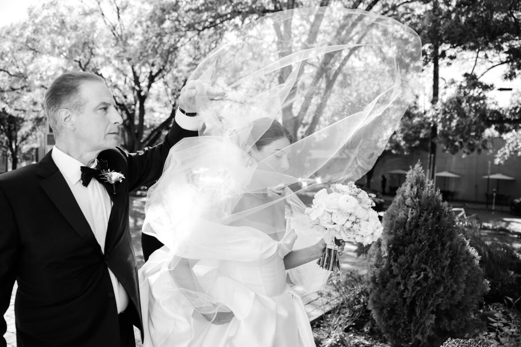 bride's veil blowing in the wind