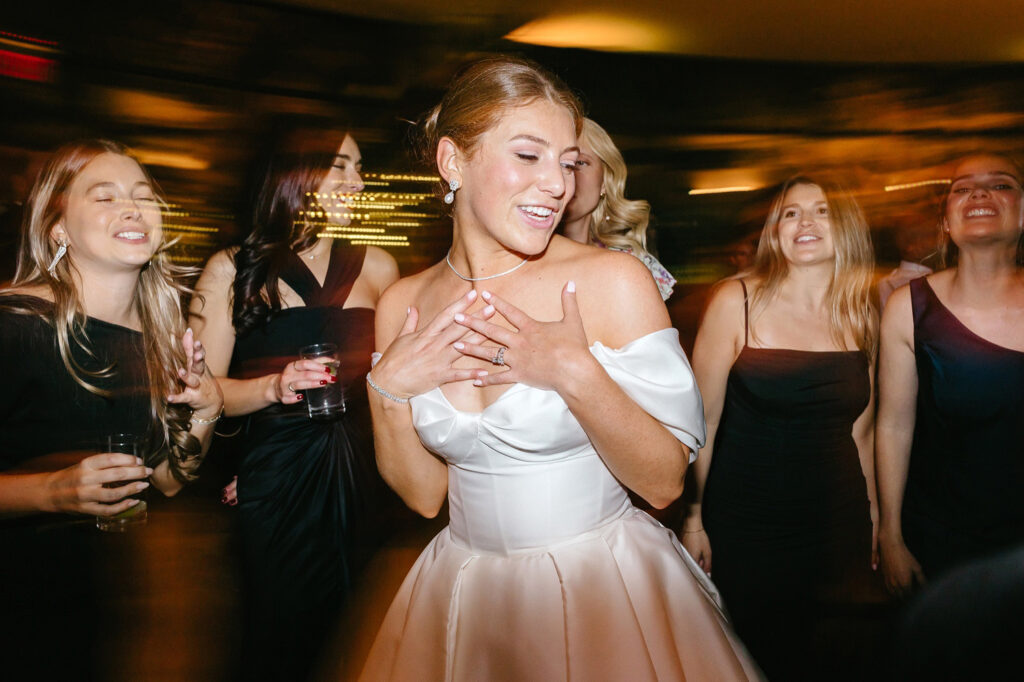 New Jersey bride having fun at her Jasna Polana wedding reception by Emily Wren Photography