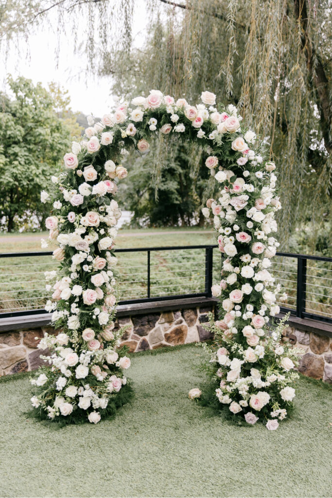 neutral floral wedding arch