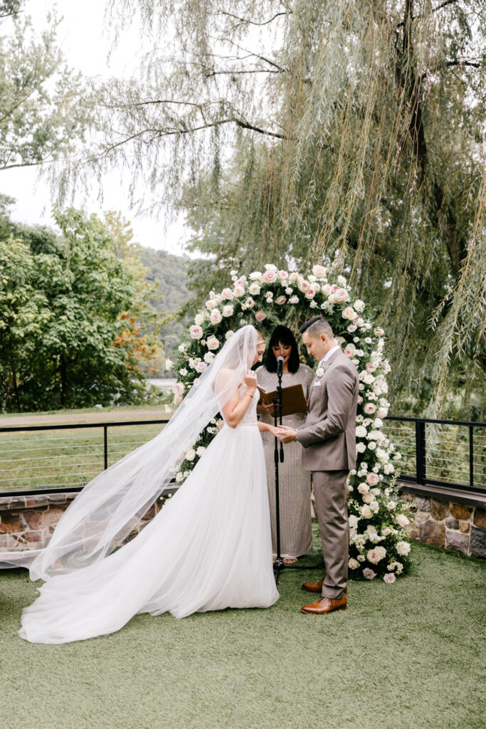 beautiful outdoor wedding ceremony at River House at Odette's by Emily Wren Photography