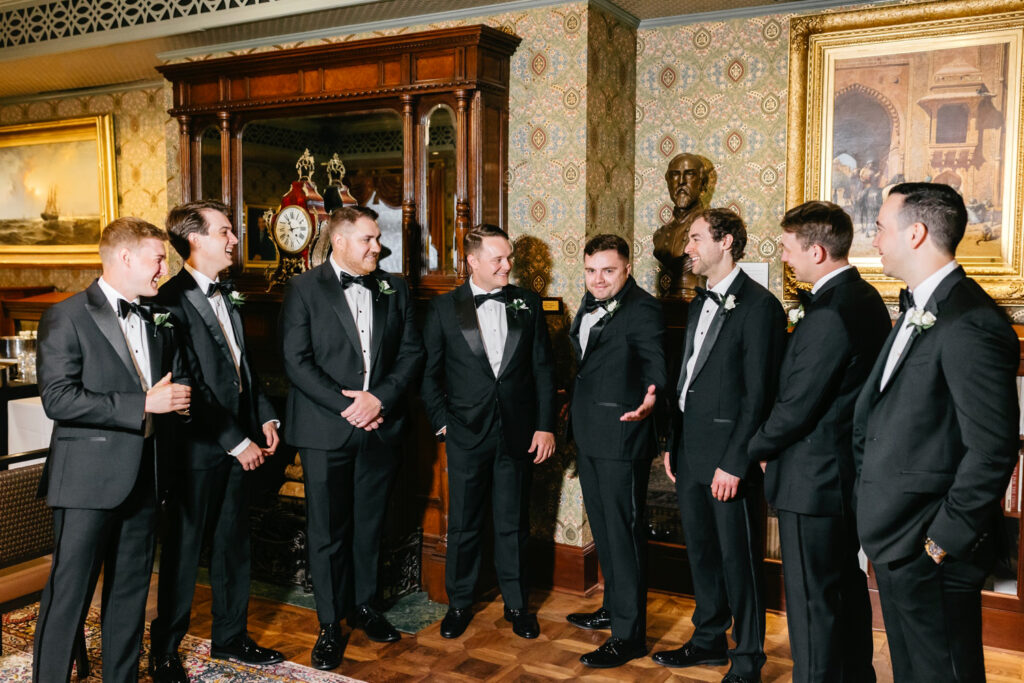 groom with his groomsmen before his Philadelphia Union League wedding day