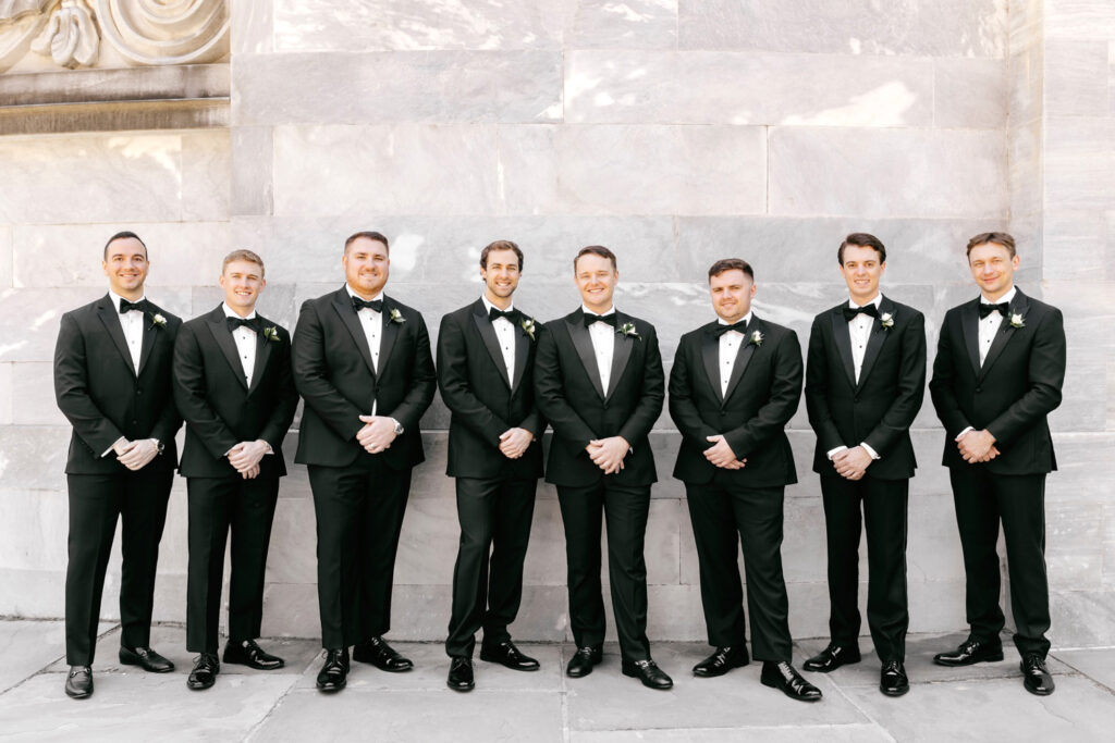 Philadelphia groom with his groomsmen at Merchant's Exchange