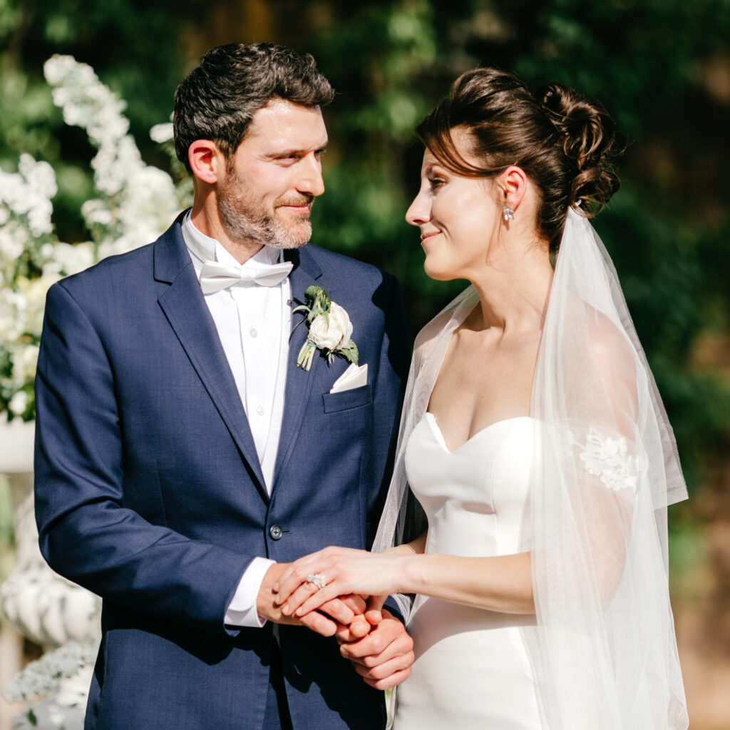 Bucks County bride & groom during their outdoor garden wedding ceremony by luxury wedding photographer Emily Wren Photography