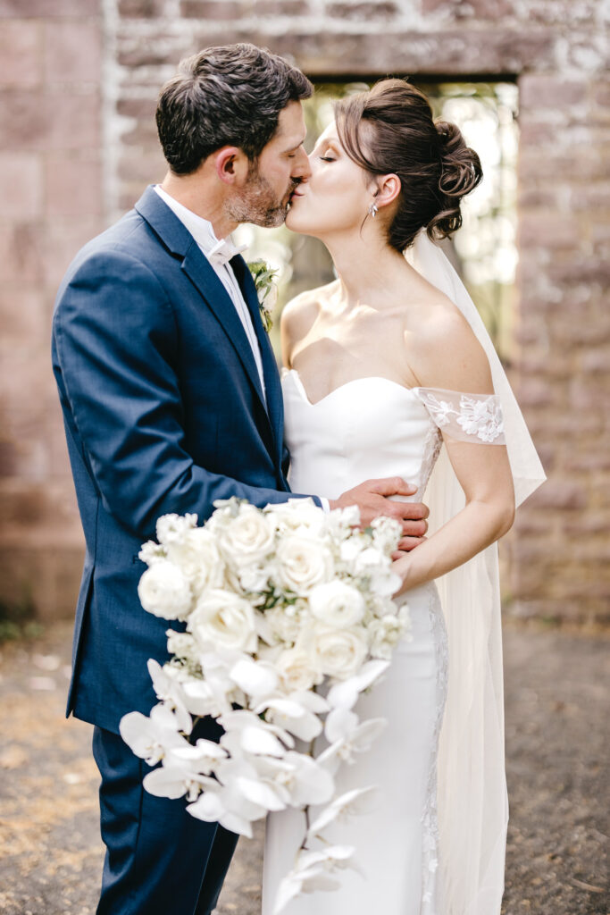 portrait of bride & groom on their spring wedding day at Tyler Gardens