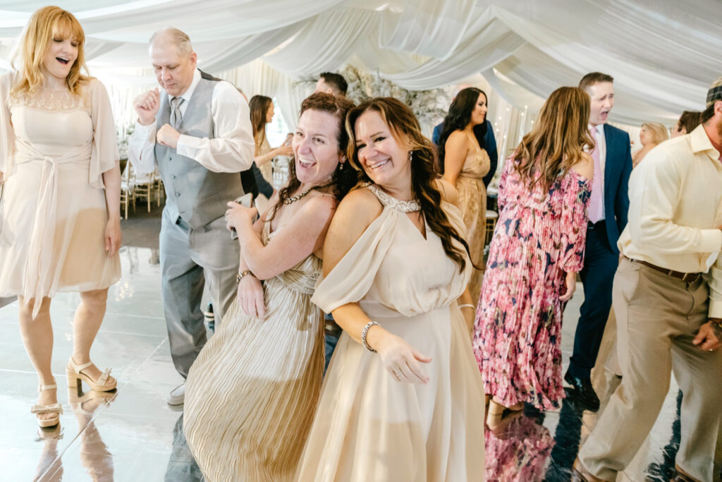 guests having fun at Tyler Gardens wedding reception by Emily Wren Photography