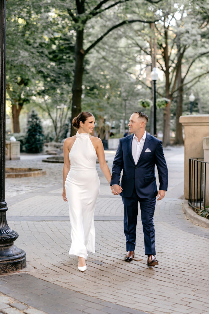 a Philadelphia couple walking through Rittenhouse Square by Emily Wren Photography