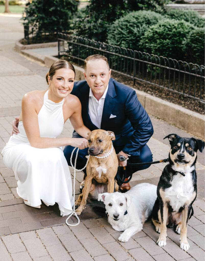 A Philadelphia couple with their dogs during their Center City engagement photoshoot by Emily Wren Photography