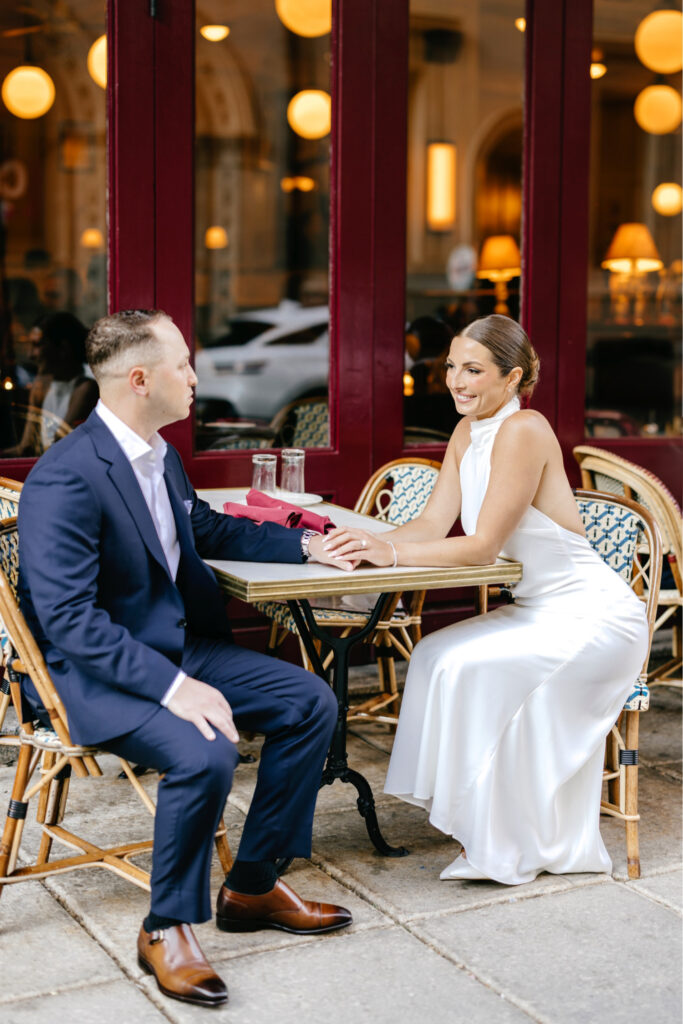 romantic engagement photos at a restaurant in downtown Philadelphia by Emily Wren Photography