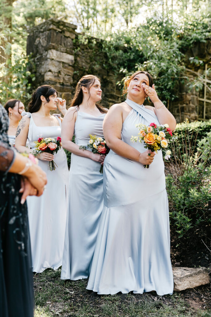 bridesmaid getting emotional during Pennsylvania spring wedding ceremony