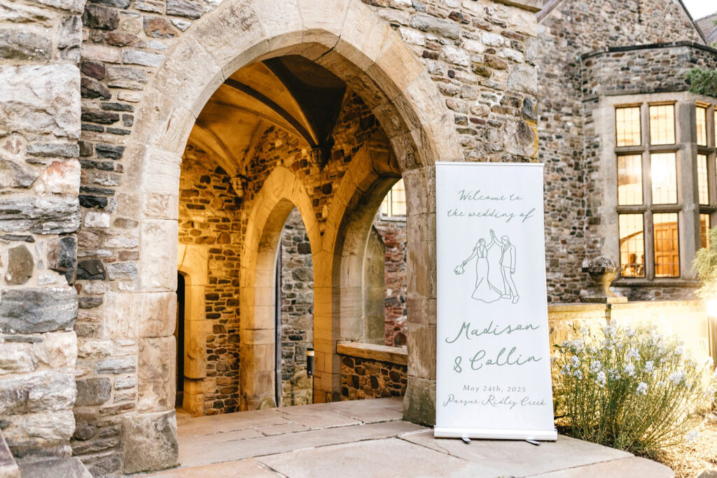 unique welcome wedding banner at Parque Ridley Creek wedding reception