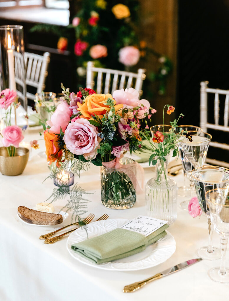 garden flower wedding reception table decor by Emily Wren Photography