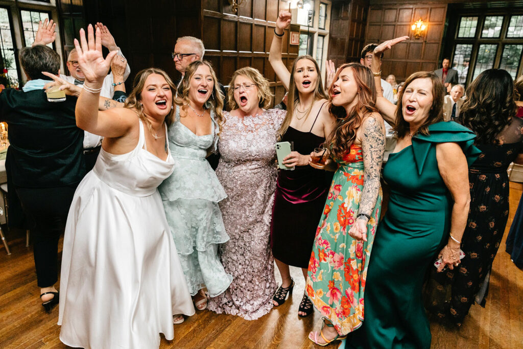 wedding guests having fun at Parque Ridley Creek wedding recpetion by Emily Wren Photography