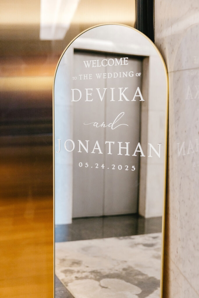 mirror wedding welcome sign at Loews Hotel by Emily Wren Photography