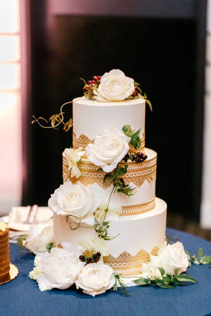 3 tier white and gold wedding cake by Emily Wren Photography
