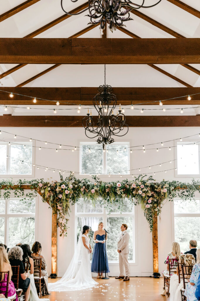indoor summer wedding ceremony at The Inn at Barley Sheaf by luxury wedding photographer Emily Wren Photography