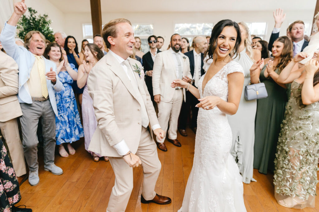 bride & groom dancing and having sun during their summer Philadelphia wedding reception