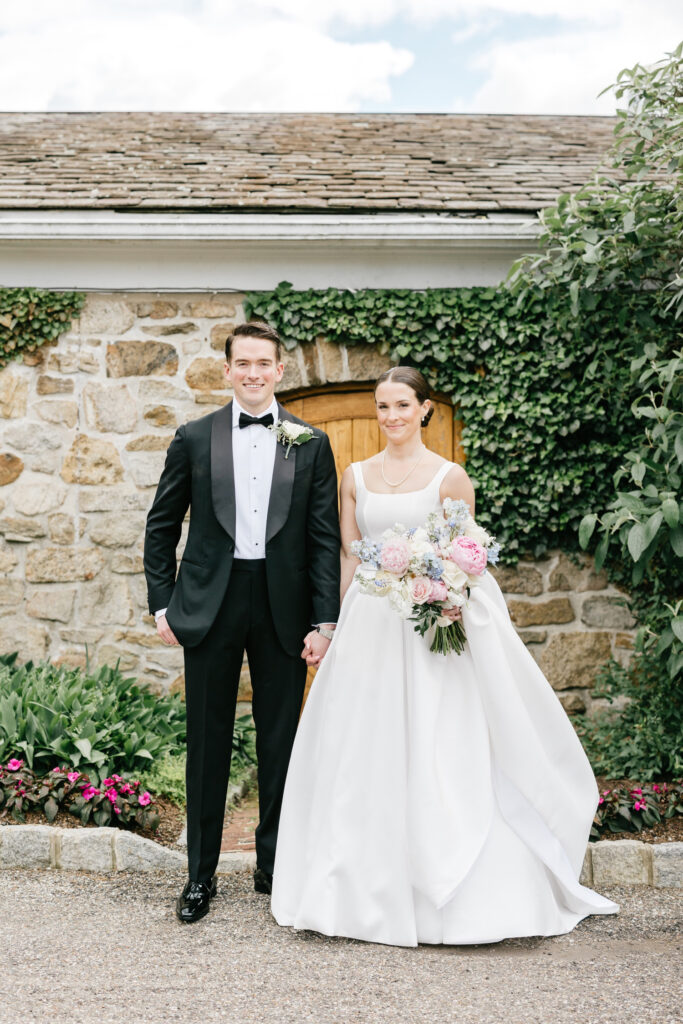 bride and groom portrait session in New Jersey garden on Spring wedding day