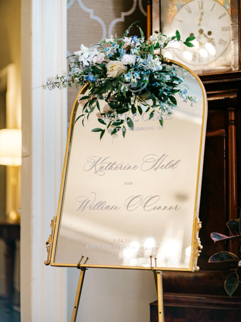 mirror welcome sign for elegant wedding ceremony by Emily Wren Photography
