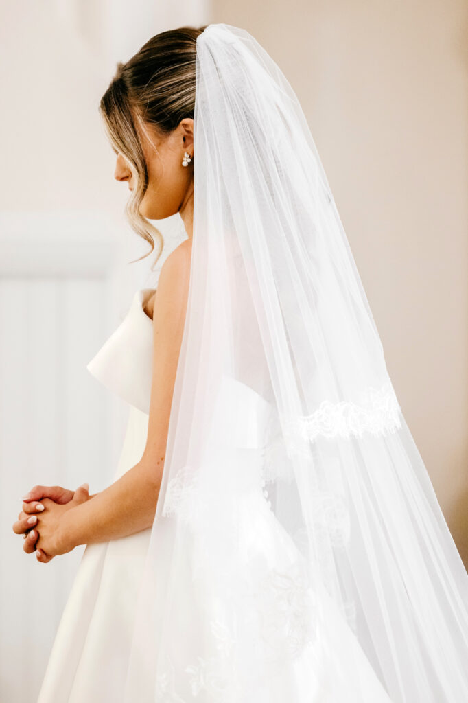 elegant bridal portrait of a Pennsylvania bride during her church wedding ceremony by Emily Wren Photography
