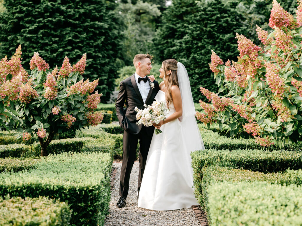 A Pennsylvania wedding couple on their summer wedding day at Appleford Estate by luxurious wedding photographer Emily Wren Photography