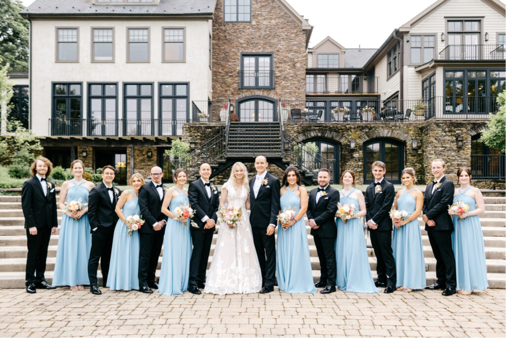 full wedding party at The Lake House Inn on a summer wedding day in Southeastern Pennsylvania
