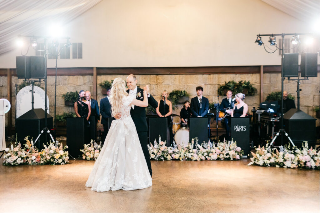 bride and groom's first dance at their summer wedding reception at The Lake House Inn