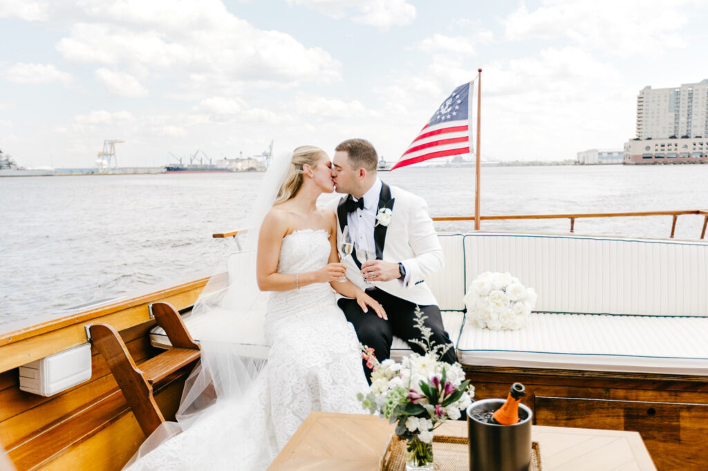 Philadelphia bride and groom on a Sea Philly boat on their spring wedding day along the waterfront at Penn's Landing