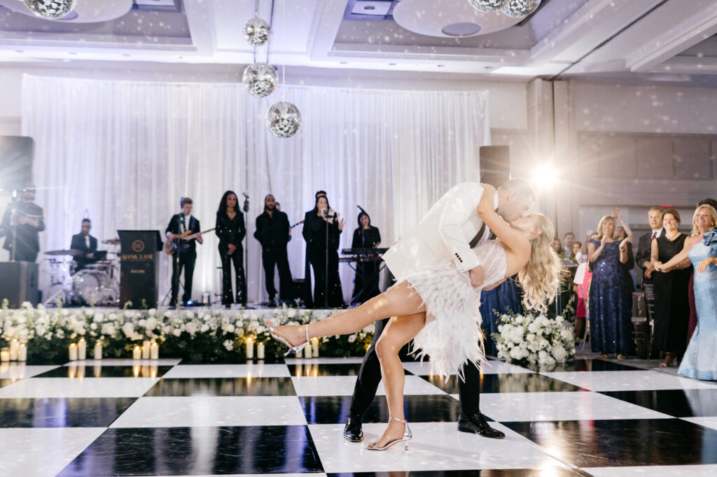bride and groom's first dance at their all white wedding reception in Old City Philadelphia by Emily Wren Photography