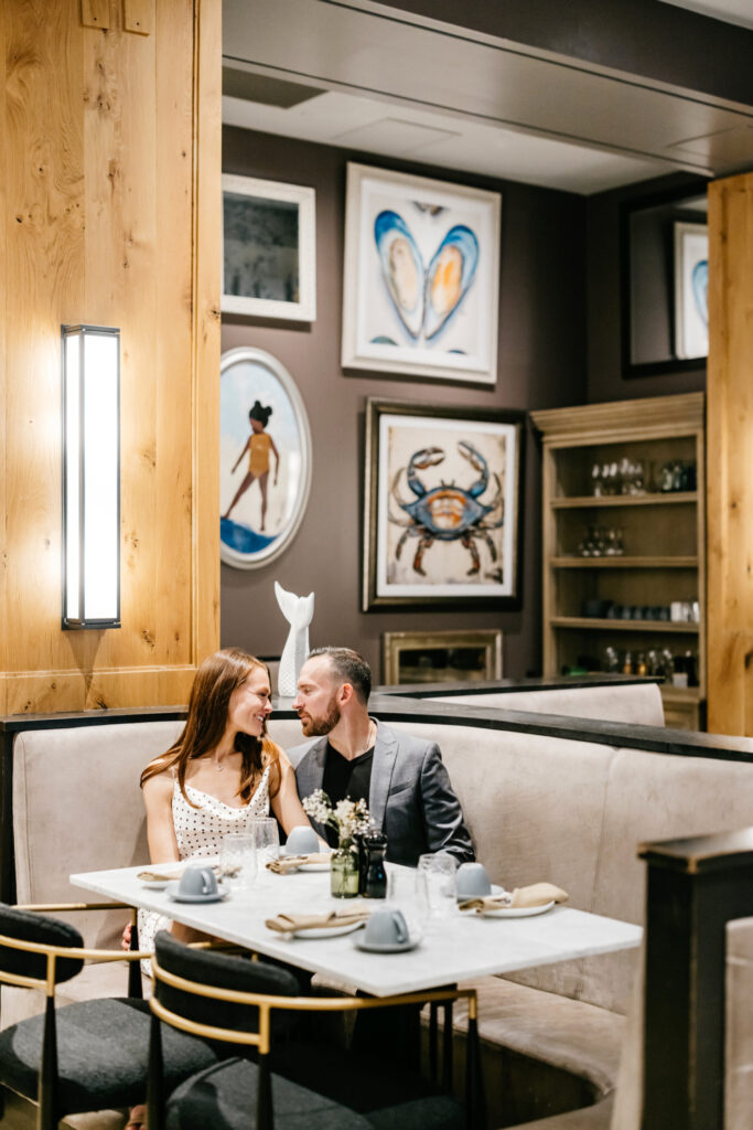 Philadelphia couple at a Center City restaurant during their spring engagement photoshoot by Emily Wren Photography