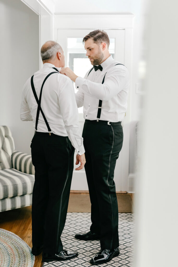 New Jersey groom getting ready for his summer wedding day in Cape May with his father